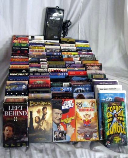 VHS MOVIE LOT PLUS: Digitech Electric Rewinder, E1211556 PlusOver 50 VHS Movie Including Not Limited To: Walt Disney Classics: Aladdin, Toy Story 2, The Cat in the Hat, Men in Black, Twister, It's A Wonderful Life, The L