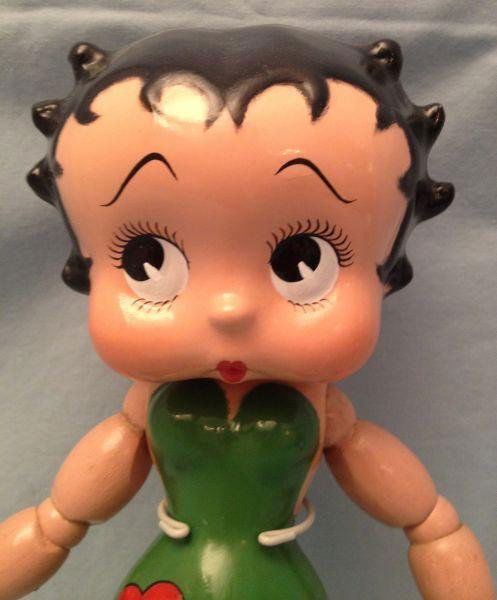 Betty Boop Ideal Doll: Betty Boop Ideal Doll Betty Boop Jointed Ideal Composition Doll Fully jointed doll with heart-shaped decal on front "Copyright Fleischer Studios".Measurements: 12" hCondition: Excellent stored in disp
