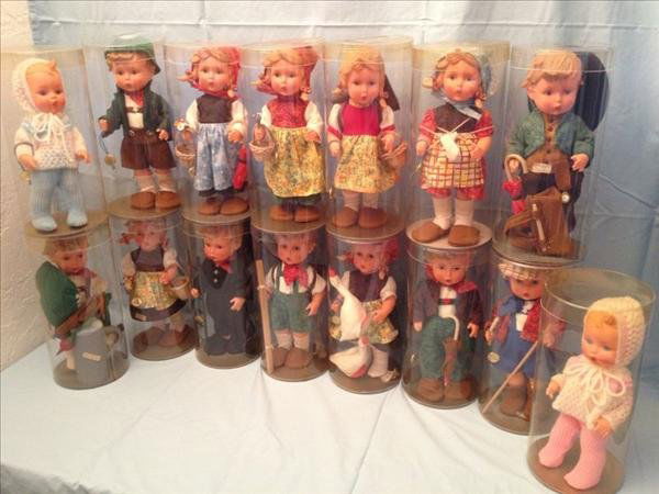 Goebel Hummel Vinyl Character & Baby Dolls: Goebel Hummel Vinyl Character & Baby Dolls 15 Goebel Hummel Vinyl Character & Baby Dolls Includes: tag and original cylinder containers.Measurements: Various sizesCondition: Very Good stored in displa
