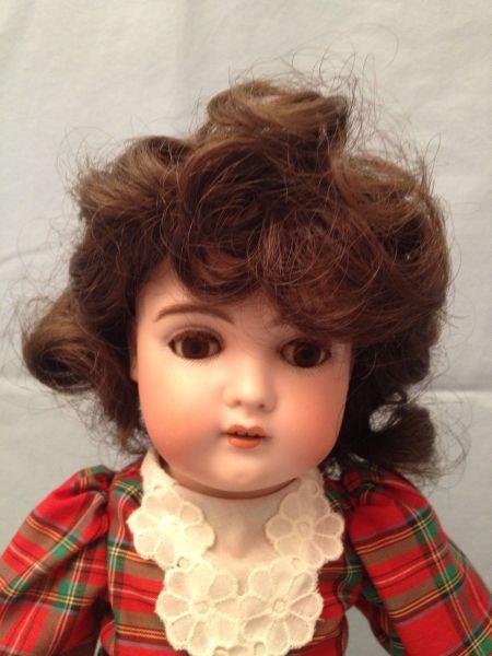 German Bisque Head Doll 457: German Bisque Head Doll 457 17" German Bisque Head Doll 457 A bisque head doll incised "457-6" with sleep eyes mink eye lashes open mouth teeth and a jointed composition body. Measurements: 17"Conditi