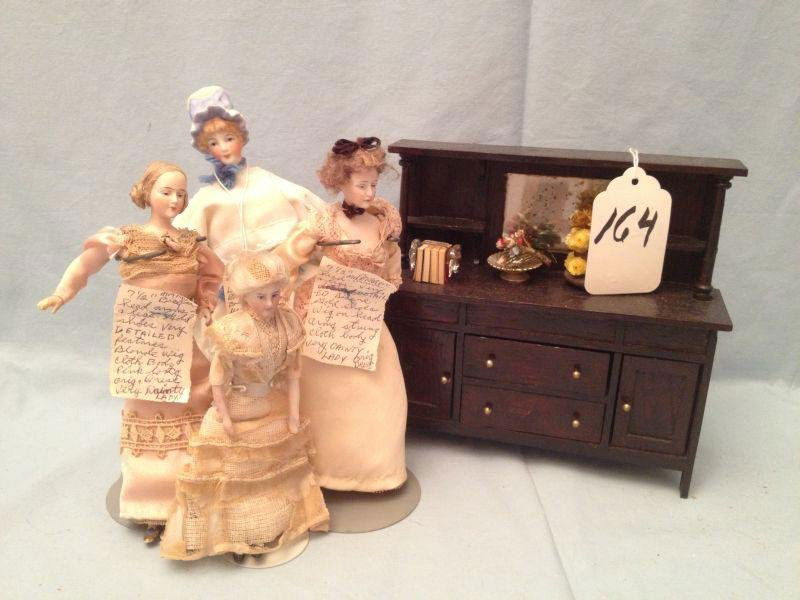 German Bisque Head Dolls & Doll House: German Bisque Head Dolls & Doll House 4 German Bisque Head Dolls & Doll House Sideboard Measurements: Dolls 7" and smaller Sideboard: 7" x 2.5"Condition: Very Good stored in display cases and from a n