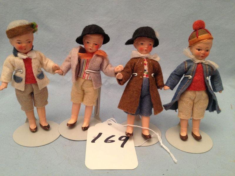 German Bisque Boy Dolls: German Bisque Boy Dolls 4 German Bisque Boy Dolls Measurements: 4" eachCondition: Very Good stored in display cases and from a no-smoking environment.