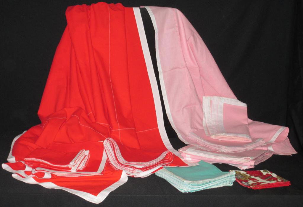 Tablecloths & Napkins Lot: Tablecloths & Napkins Lot including 1 red tablecloth 84" x 65"; 12 red napkins; 1 pink tablecloth 42" square; 2 pink tablecloth 43" square; 24 pink napkins; 6 green napkins; 4 floral print napkins.