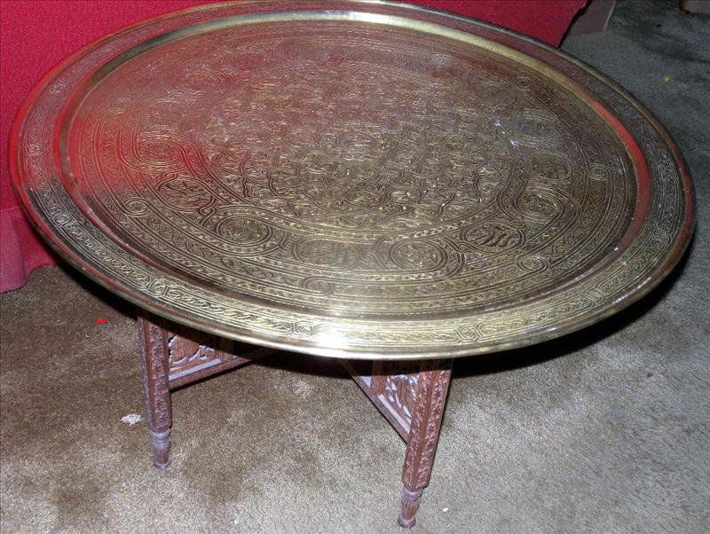 BRASS TRAY TABLE: Brass Tray Table, Engraved 33"D, Table 21.5"T, Folding Base w/Cut-Out Decorations.