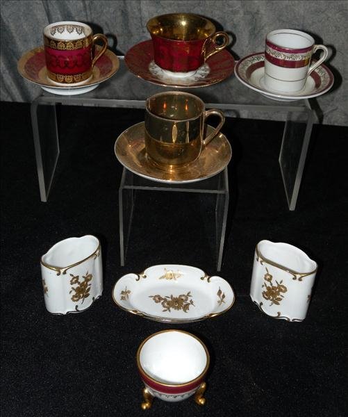 COLLECTABLE PORCELAIN CUPS PLUS: Collectable Porcelain Cups Plus, Including Noritake, Baraarian, Occupied Japan, Gold Made In Japan (Repaired), German Cigarette Holder And Ashtray, And Limoge Egg Cup.