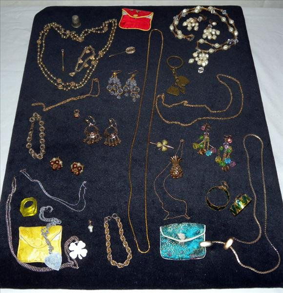 LINKED CHAIN BRACELET AND COSTUME JEWELRY LOT: Linked Chain Bracelet And Costume Jewelry Lot, Includes 7 Pair Of Earrings, 5 Chains, 4 Necklaces, 3 Bracelets, Keychain, 3 Pendants, Pin, Ring, Sweater Clip, 3 Small Pouches And 1 Thimble.