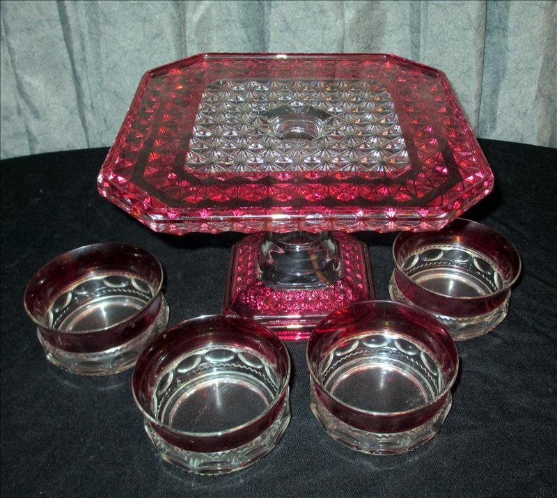DEPRESSION GLASS CAKE PEDESTAL PLUS: Depression Glass Cake Pedestal Plus, Includes 6.5"T Flashed Red On Clear Glass Pedestal And 4 Molded 2.25" Bowls.
