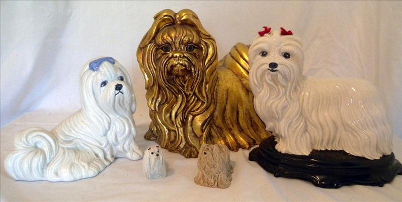 CERAMIC DOG LOT: CERAMIC DOG LOT Includes 10" T gold colored dog, marked Kay Finel 837 USA, 9" dog w/red ribbons, 7.25" dog w/blue uniform, 2.75" clay dog and 2.25 pottery dog.