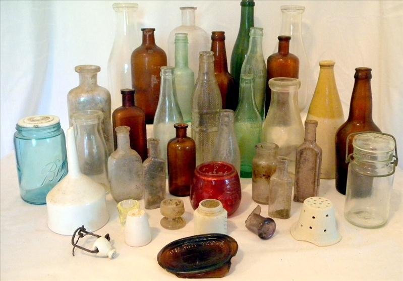 BOTTLES FROM CHIPOLA RIVER: BOTTLES FROM CHIPOLA RIVER Includes 4 clear milk bottles (apprx. 9.5", 7.5", 5.5" 2 w/pontils and 2 w/seam pressed glass), 2 - 7.5" T Purity brand marked property of Purity Bottle Works, Mariana FLA (