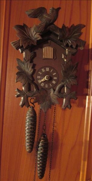 GERMAN CUCKOO CLOCK: GERMAN CUCKOO CLOCK 6" W x 5" D x 8.75" T, Carved wood, works, no markings