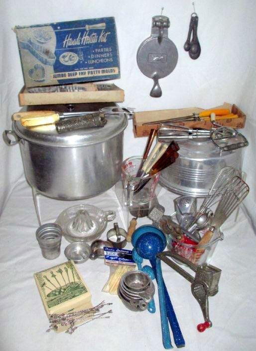VINTAGE KITCHEN LOT: Including Aluminum Cake Plate and Cover, Stock Pot, Deep Fry Patty Molds (w/Original Box), Reamer, Carving Set, Measuring Cups and Silver Hors d'Oeuvre Picks (Original Box) Plus More.