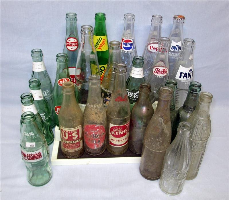 24 Soda Bottles: 24 Soda Bottles, Inc. A Variety of Brands: Coke From Harrisburg PA, Cookeville TN, New York NY, Columbia MS, 1993 Alabama National Champions, Also Inc. Fanta, Pepsi Cola, Mello Yello, Dr. Pepper & US 