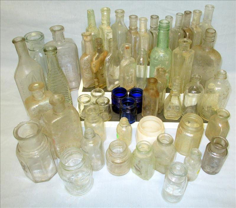 Over 50 Vintage Bottles: Over 50 Vintage Bottles Inc. Medicine, Whiskey, Crème, Etc.; Some As Early As 1900. One Embossed Old Spring Distilling Co. Cincinnati OH, Another Embossed FM Plank Chattanooga TN.