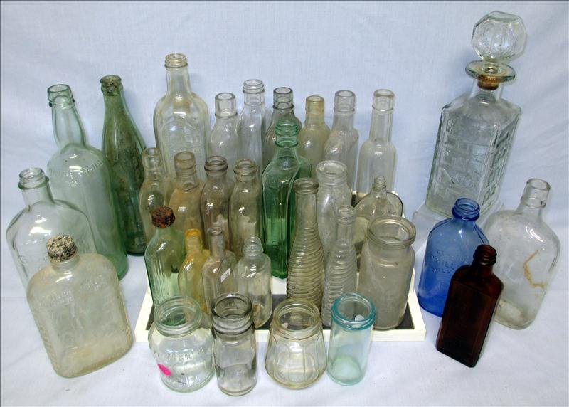 Over 30 Vintage Medicine Soda Whiskey Flask Bottles: Over 30 Vintage Medicine Soda Whiskey Flask Bottles, Some As Early As 1900; One Decanter Embossed With License Tags, One Flask Embossed Lincoln Inn and One Embossed The Reliable Old-Time Preparation F