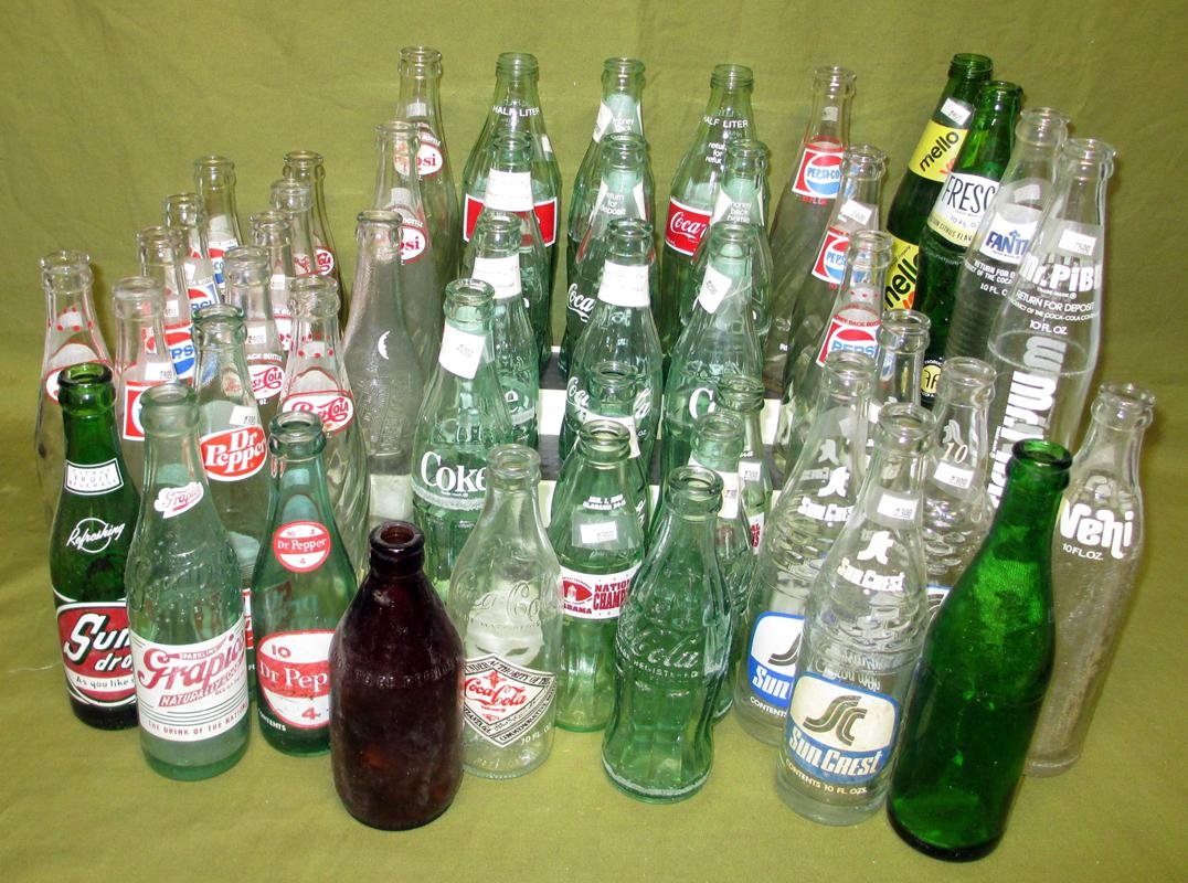 Over 40 Soda Bottles: Over 40 Soda Bottles, Inc. Sun Drop, Pepsi, Grapico, Dr. Pepper, Nehi, Sun Crest, Mello Yello, Fresca, Mr. Pibb, Fanta, Coca-Cola from Beaumont TX, Dothan AL, Baltimore MD, Albany GA, Dallas TX, St. C