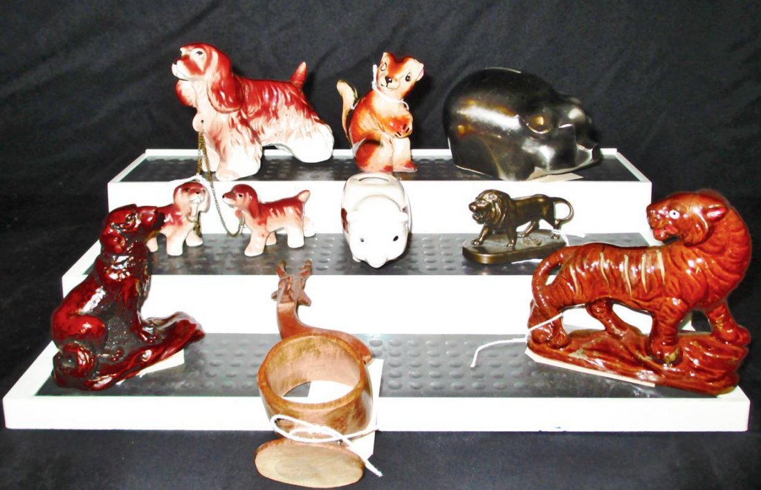 Animal Lot: Various Materials Including Vintage Pewter Piggy Bank, Soapstone Dog, Terra Cotta Tiger, Hand Carved Deer Napkin Ring, Ceramic Pig Vase, Lion's Club Metal Lion, Spaniel w/2 Puppies and Ceramic Squirre