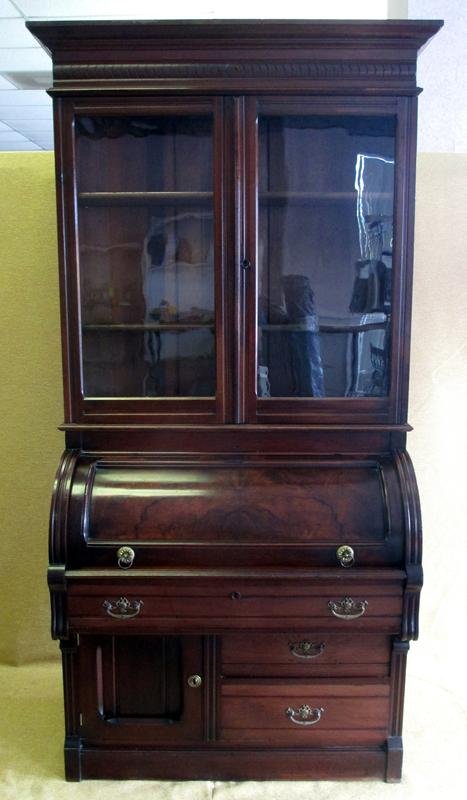 Victorian Cylinder Desk: Glass Doors Under Decorative Cornice, Cylinder Opens to Cubby Holes, w/Scallop & Dowel Dovetailing Over 2 Drawers Beside One Door, 1875-1885, 40" x 21.75" x 86"T.