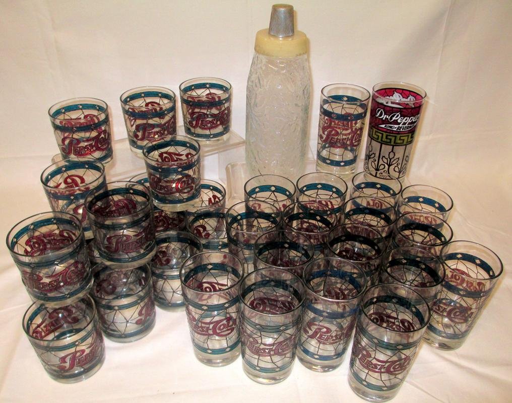 Pepsi Collector Glasses Plus: 18 Tumblers, 17 High Balls, Dr. Pepper High Ball and Liquor Bottle w/Embossed Decoration.