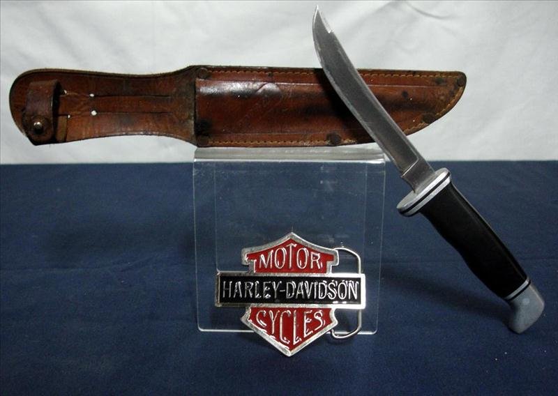 Harley-Davidson Buckle & Buck Knife: Harley-Davidson Buckle & Buck Knife, Including Metal Harley Motor Cycles Belt Buckle and a 8.25" (Total Length) Buck 118 USA Knife in Leather Sheath.