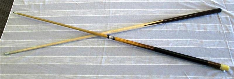 Pool Table Accessories - Cue Sticks: Pool Table Accessories - Cue Sticks, Including Two Inlaid Cue Sticks:Players 2-Piece #803, 58" L (Slight Marring) and Unmarked 3-Piece (Missing Stopper End), 57.5" L Together w/One Padded Blue Carryin