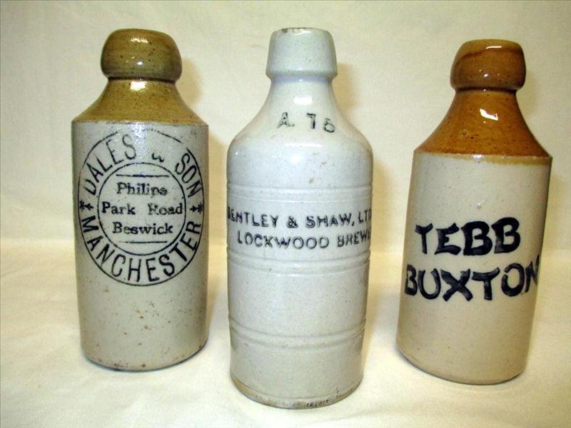 Ceramic English Beer Bottles: Ceramic English Beer Bottles, Including Three Advertising Bottles, 6.75" to 7" Tall.