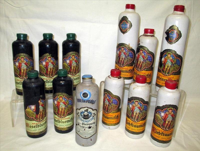 12 Wine Bottles: 12 Wine Bottles, Including Rheinperle Liebfraumilch, 6 Beameister Liebfraumilch and 5 Beameister Moselbluemchen, 8" to 11" Tall.