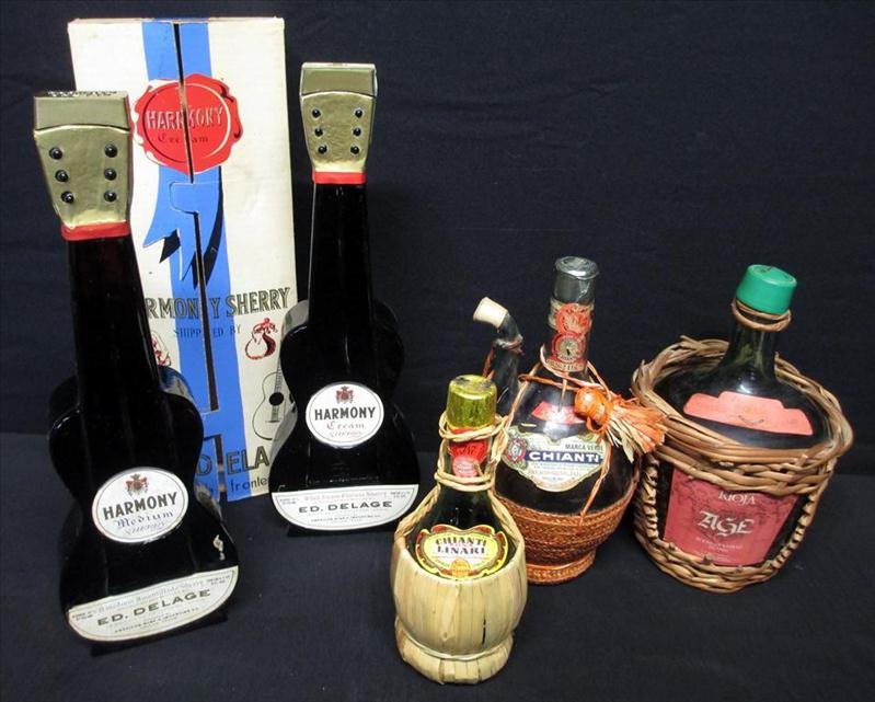5 Bottles Sherry and Wine: 5 Bottles Sherry and Wine, Including Harmony Medium Sherry (Guitar Bottle), Harmony Cream Sherry in Box (Guitar Bottle), Both 15.75"; Chianti Linari, 9.25"; Rioja Age, 10.25"; Chianti, 10.75".Three in