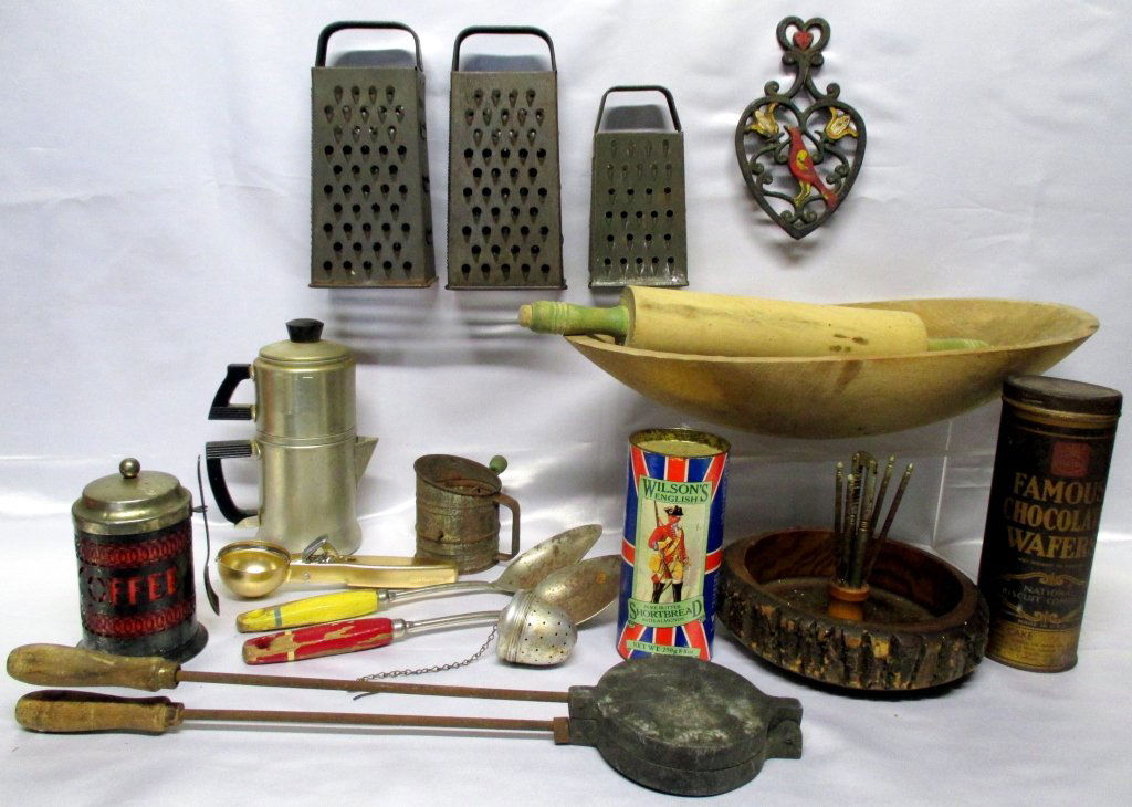 Vintage Miscellaneous Kitchen Lot: Including 2 graters, 2 cookie tins (Nabisco & Wilson),18.5" dough bowl, rolling pin, fireplace pie mold, 3" tall sifter, plus. Rust.