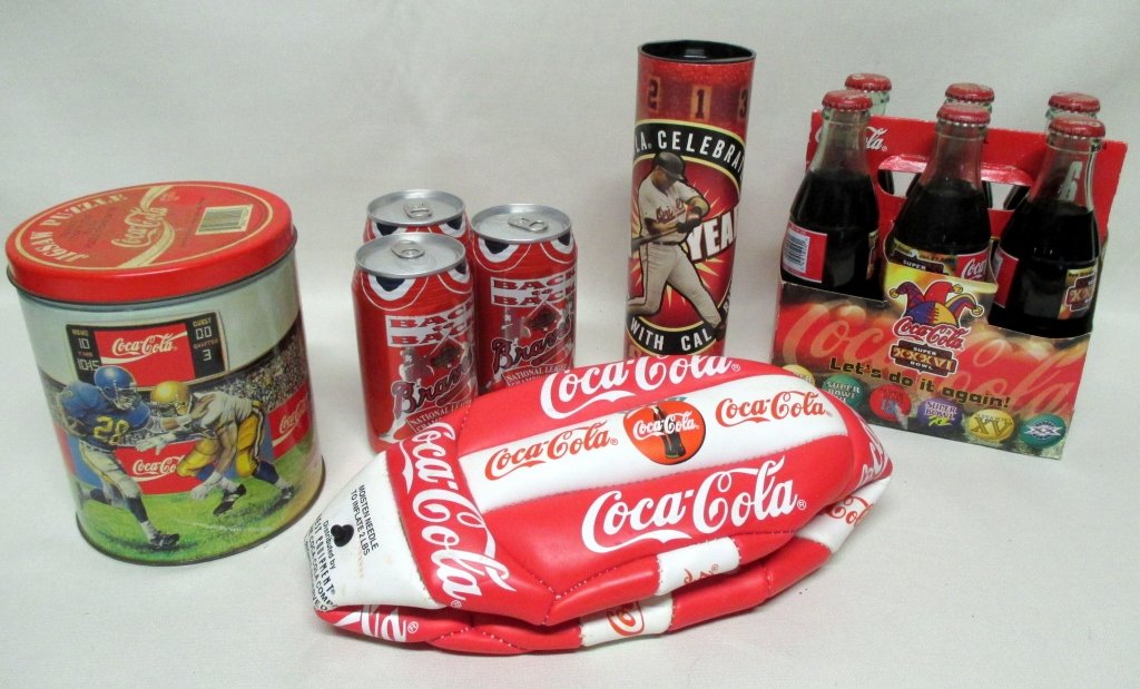 Coca Cola Sports Collectibles: Including 6-pack, tin w/puzzle, 3 cans, ball and 2001 Cal Ripken bottle in can.