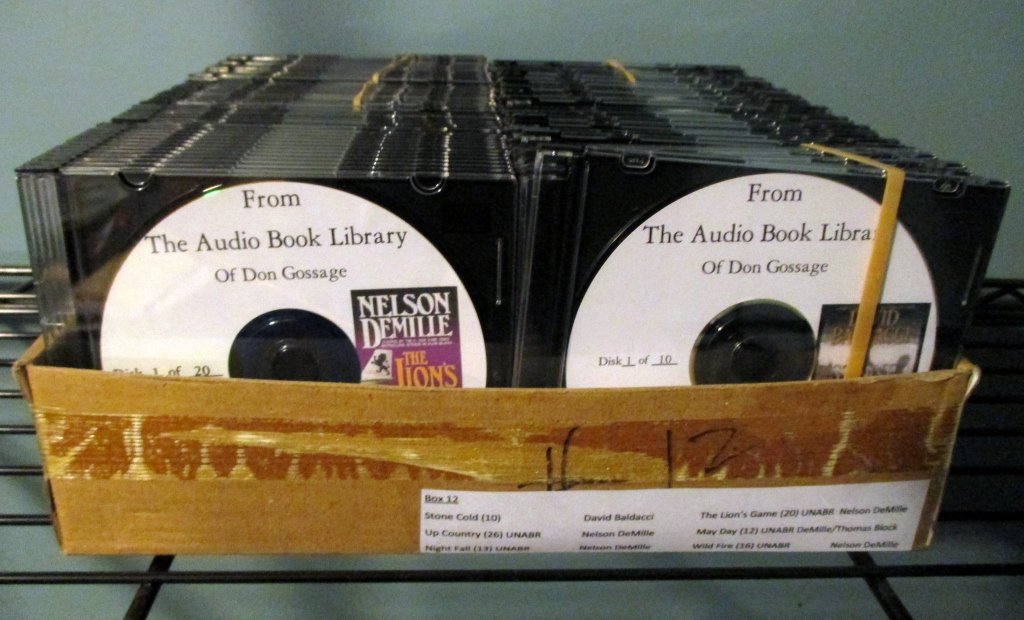 Audio Books on CDs: 97 CDs, 6 books by David Baldacci and Nelson DeMille. See attached photos for detailed listing.