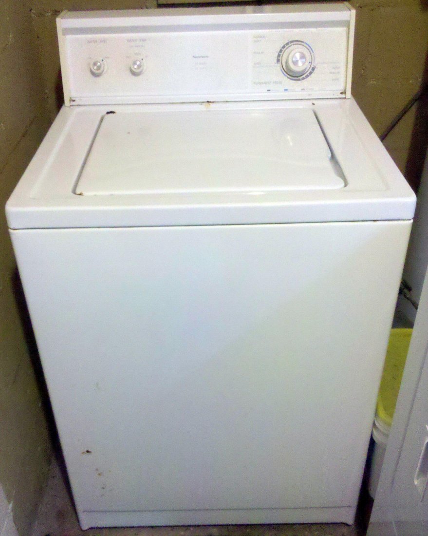 Kenmore Washer: 60 Series, Extra Capacity, White. Interior pictured with some rust.