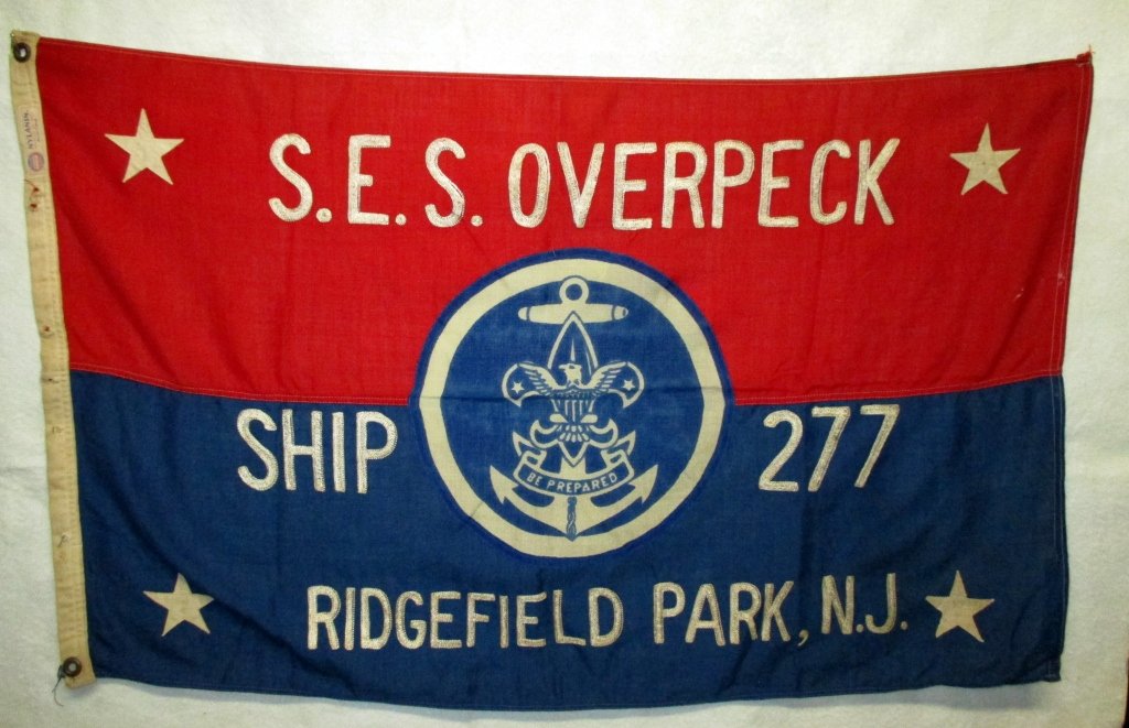 Sea Scouts Flag: S. E. S. (Sea Explorer Ship) Overpeck, Ship 277, Ridgefield Park, N. J. nylon & wool, 23" x 38". Holes on grommet edge.