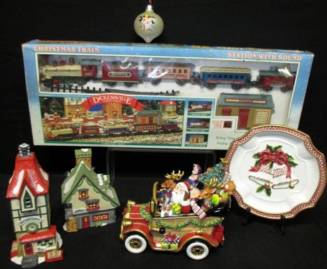 Christmas Fitz & Floyd Plus: Inc. 9" plate, 8" Santa Mobile (both Fitz & Floyd), Dickinson collectible Christmas Train set, 2 ceramic buildings from Heritage Village and Mickey Mouse ornament.
