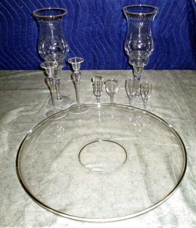 Glass Platter, Candleholders & Liquor Glasses: 16.5" D platter, 4 candleholders (2 w/etched hurricane shades) & 4 liquors.