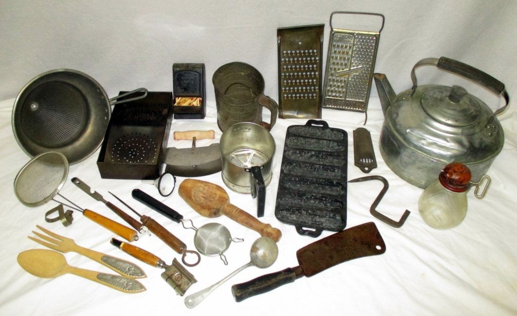 Vintage Kitchen Utensils Plus: Graters, sifters, sieve, aluminum kettle, wall match holder, meat hook, cast iron corn stick pan plus more