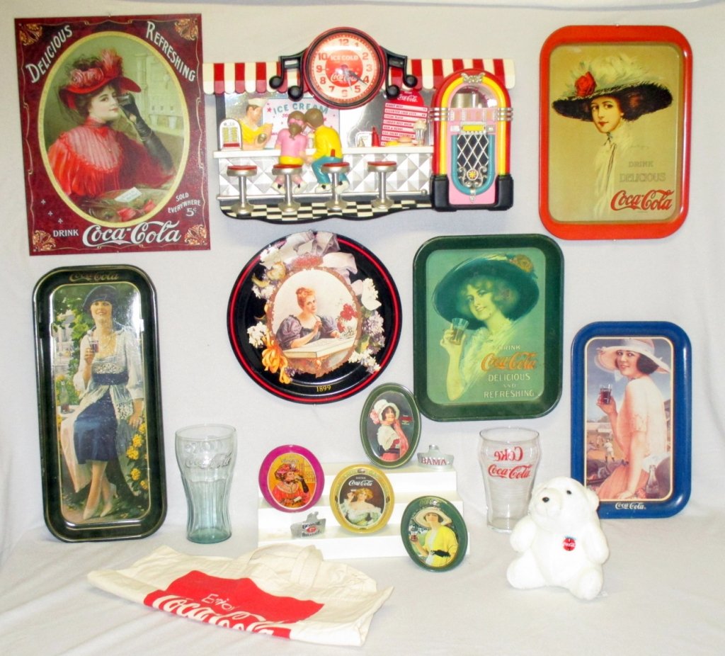 Coca Cola Collectibles: 5 lady trays, lady metal display, soda fountain clock, 4 lady tip trays, plush bear, tote, 2 large glasses together w/2 wall mount bottle openers: Bama and Georgia Bulldogs.