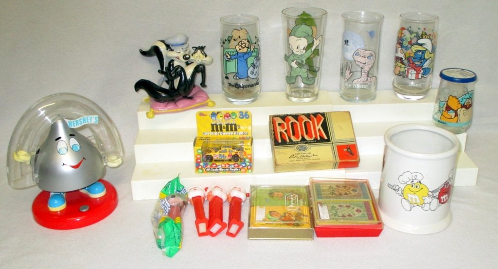 Children's Collectibles & Games: 1999 Hershey's Candy toy, M&M racer in orig. pkg & ceramic holder, 4 Pez (Mickey in orig. wrapper & 3 Santa), 4 glasses (Smurfs, ET, Chipmunks, Elmer Fudd), Welch Pooh glass w/lid, Ltd. Ed. Looney Tun