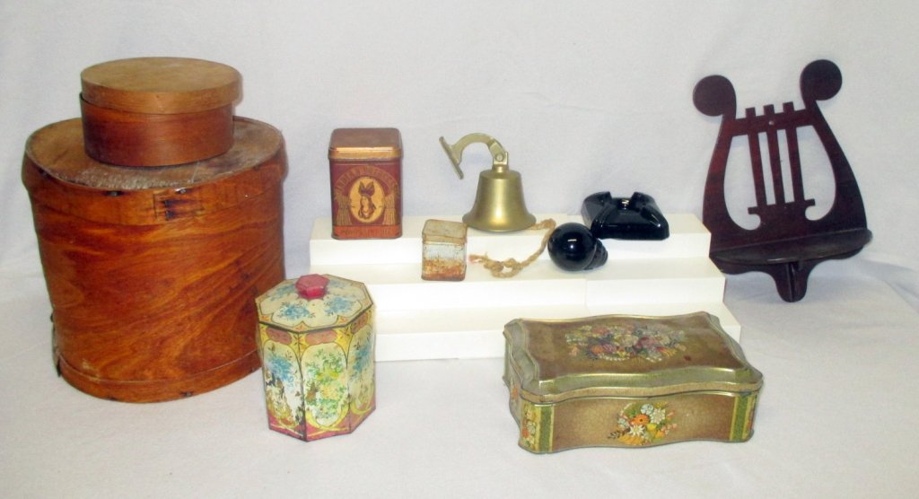Primitive Plus Lot: Tins, handmade round boxes (tallest 10.5"), brass bell, ashtray and lyre wall shelf.