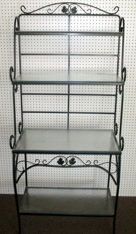 Baker's Rack: Green metal frame w/4 hammered glass shelves, 31" x 18" x 69" tall.