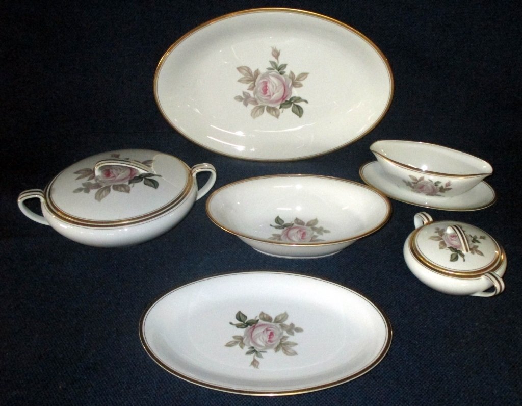 8 Serving Pieces Noritake Oliver: Decorated w/large rose including: covered double handled casserole, gravy boat w/attached underplate, 12" platter, 16" platter, oval vegetable and covered double handled sugar.