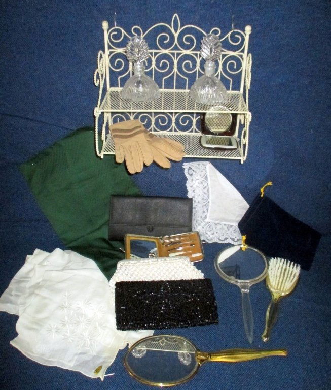 Ladies Lot w/Delicate Metal 2-Tier Shelf: Including 12.5" x 10.5" tall shelf, 2 perfume bottles w/ground stoppers, 3 evening bags, gloves, 2 hand mirrors & brush, dresser tray and mint Hong Kong handkerchief & 8 large hand rolled Philippine c