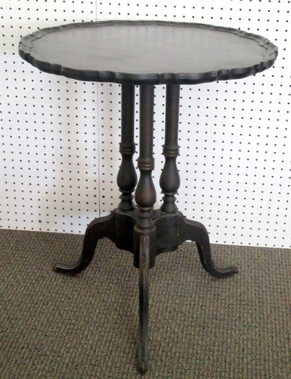 Mahogany Tilt Top Table: Pie crust top, triple standard w/finial and snake feet, 27.5" tall.