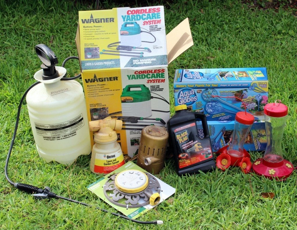 Assorted Garden Tools: Wagner cordless sprayer, large 2-gallon sprayer, small sprayer, duster, sprinkler, humming bird feeders and aqua water globes.