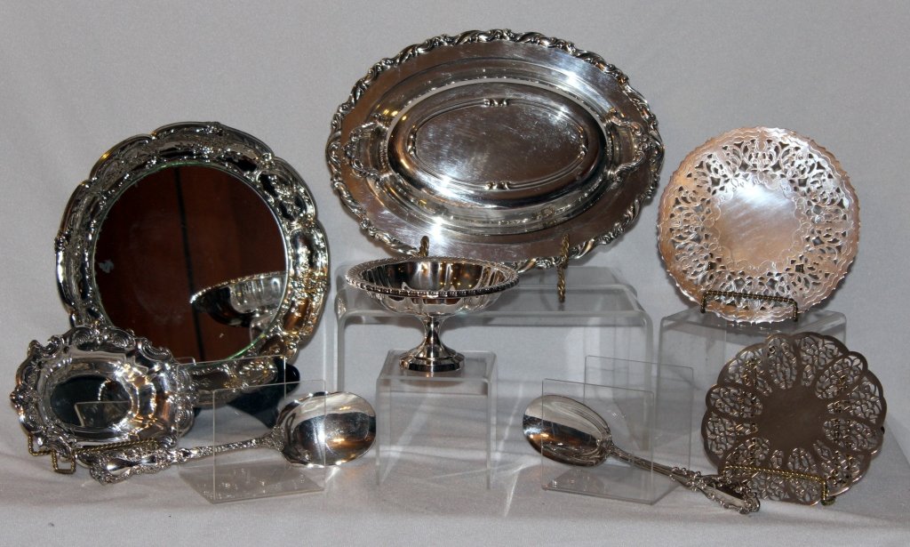 Silverplate Serving Pieces: Covered vegetable, Towle nut dish, Oneida compote, 2 trivets, 10.5" diameter mirrored dish, berry spoon and Gorham stuffing spoon.