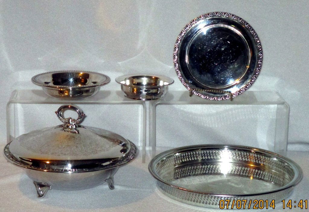 Silverplated Serving Pieces: Footed & covered casserole; 7.5", 10" & 12.25" round trays; 12" gallery tray, pierced trivet, bowl & English wine coaster w/Oriental design.