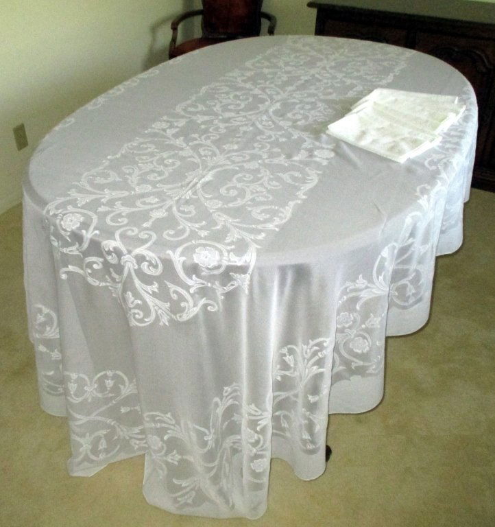 White Tone on Tone Tablecloth & 11 Napkins: See through design, 122.5" x 65".