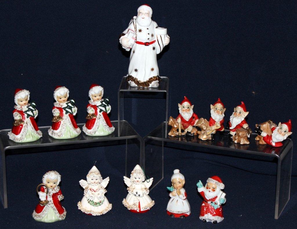 Christmas Ceramics: 4 Lefton bells, angel (1 wing tip broken) & Mr. & Mrs. Claus (paint losses) salt & Peppers, 4 elves and Fine Porcelain European Collections Father Christmas 6.5" tall.