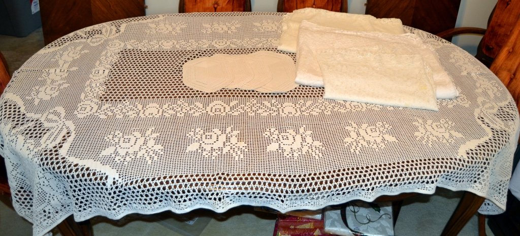 Crocheted & Lace Tablecloth Plus: Inc. a crocheted tablecloth (47" x 77"), 3 lace tablecloths (some stains, 66" x 76", 84" x 60" and 58" x 90"), together w/4 crocheted doilies (3 at 9" and 1 at 12").