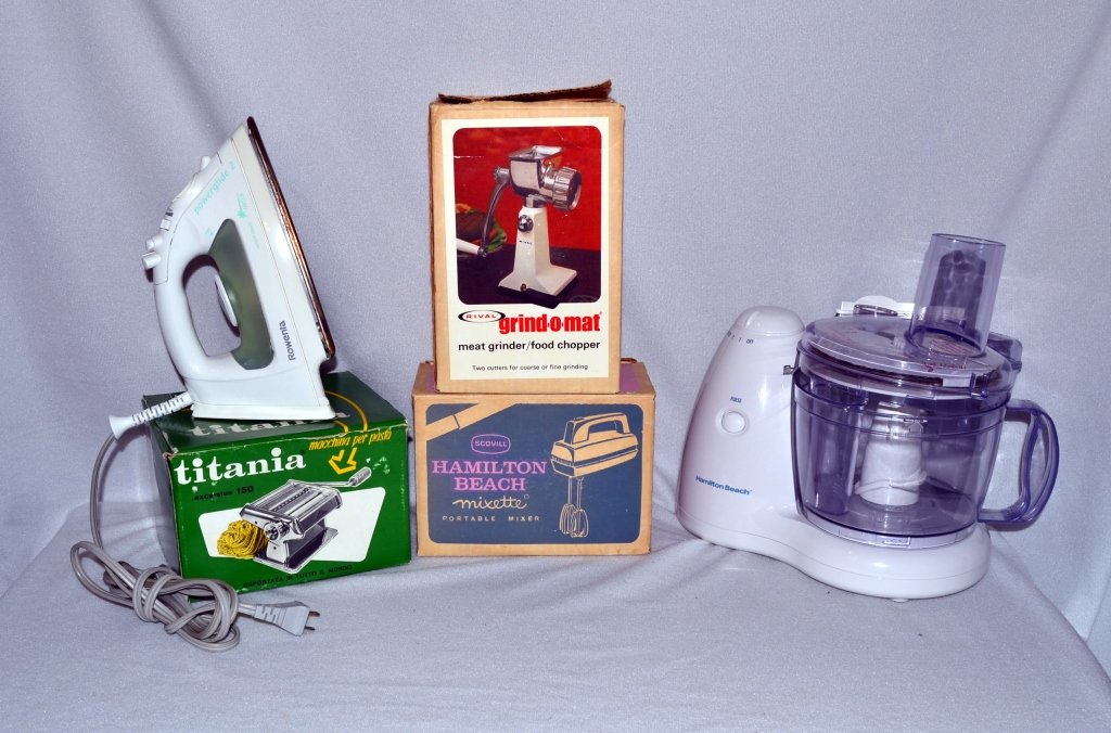 Small Kitchen Appliances: Inc. Titania pasta maker, Rowenta iron, Rival Grind-O-Mat meat grinder/chopper and Hamilton Beach food processor.