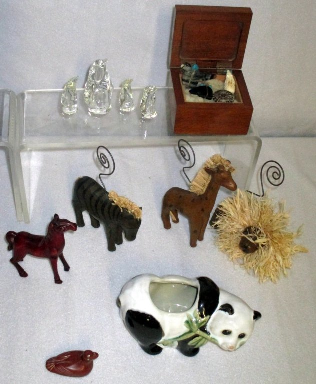 Collectible Animal & Bird Lot: Mixed materials to include: stone decorated box w/small figures, marked panda planter, 4 glass penguins, signed stone duck (1.75" long), wooden horse and 3 wooden/raffia animals.